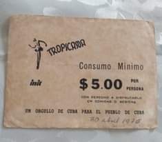 May be an image of ‎text that says '‎ر TROPICARA Consumo Minimo init $5.00 PERSONA POR CON DERECHO DISFRUTARLO EN COMIDAS 0 BEBIDAS UN ORGULLO DE CUBA PARA EL PUEBLO DE CUBA 30 abal 1975‎'‎