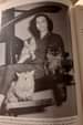 May be an image of 1 person, cat and text that says 'PATR stración 24. Adela Escartín en 1956 posando con ffi Agamenón) en la'