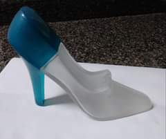 May be an image of cake and high-heeled shoes