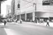 May be a black-and-white image of 9 people, street and road