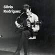 May be an image of 1 person, standing and text that says 'Silvio Rodríguez'